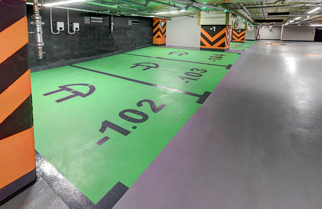 miejsca postojowe dla samochodów elektrycznych na parkingu podziemnym Warsaw Unit